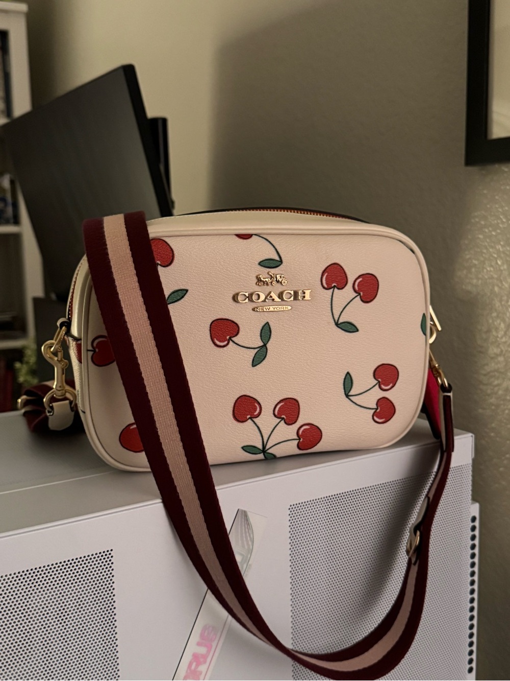 Coach Pink Cherry-Print Crossbody Bag with Striped Strap - Picture 1 of 4